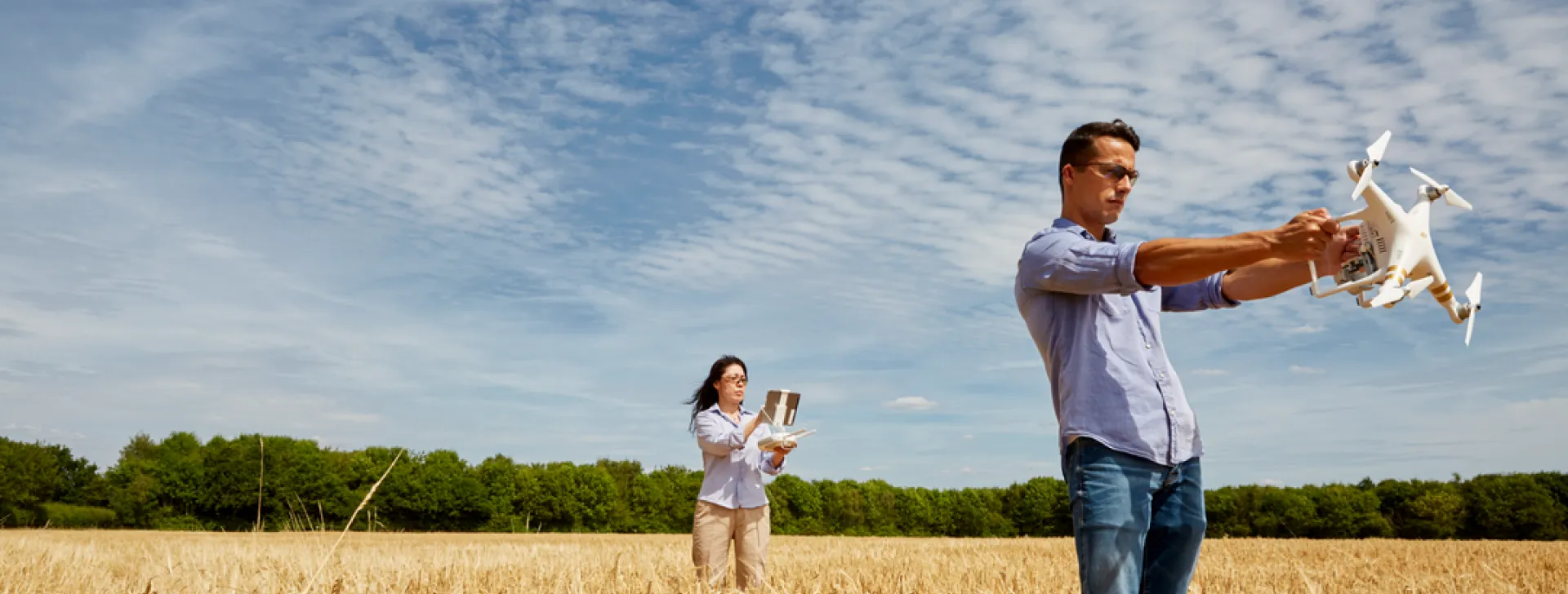 People with drone in field - climate change